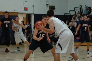Bourne High School point guard Jacob Ashworth tries to get by Apponequet's Stephen O'Malley in last night's 57-54 victory for the host Canalmen. Bourne is the last unbeaten boys hoop team on the Cape this season at 5-0. Sean Walsh/www.capecod.com sports