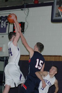 Bourne High's Connor Schaefer tears down this rebound over the Lakers' Stephen O'Malley (15) while Tyler Rondeau (11) gets caught in the crossfire. Sean Walsh/www.capecod.com sports