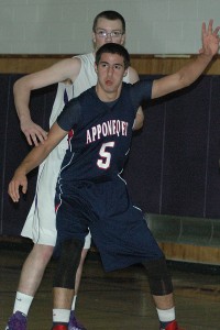 Apponequet High School's Kevin Falaki tries to get position underneath on Bourne's Connor Schaefer. Falaki had 16 of his 20 points in the second half. Sean Walsh/www.capecod.com sports