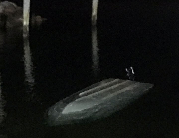 Coast Guard rescue man held on to boat for 12 hours