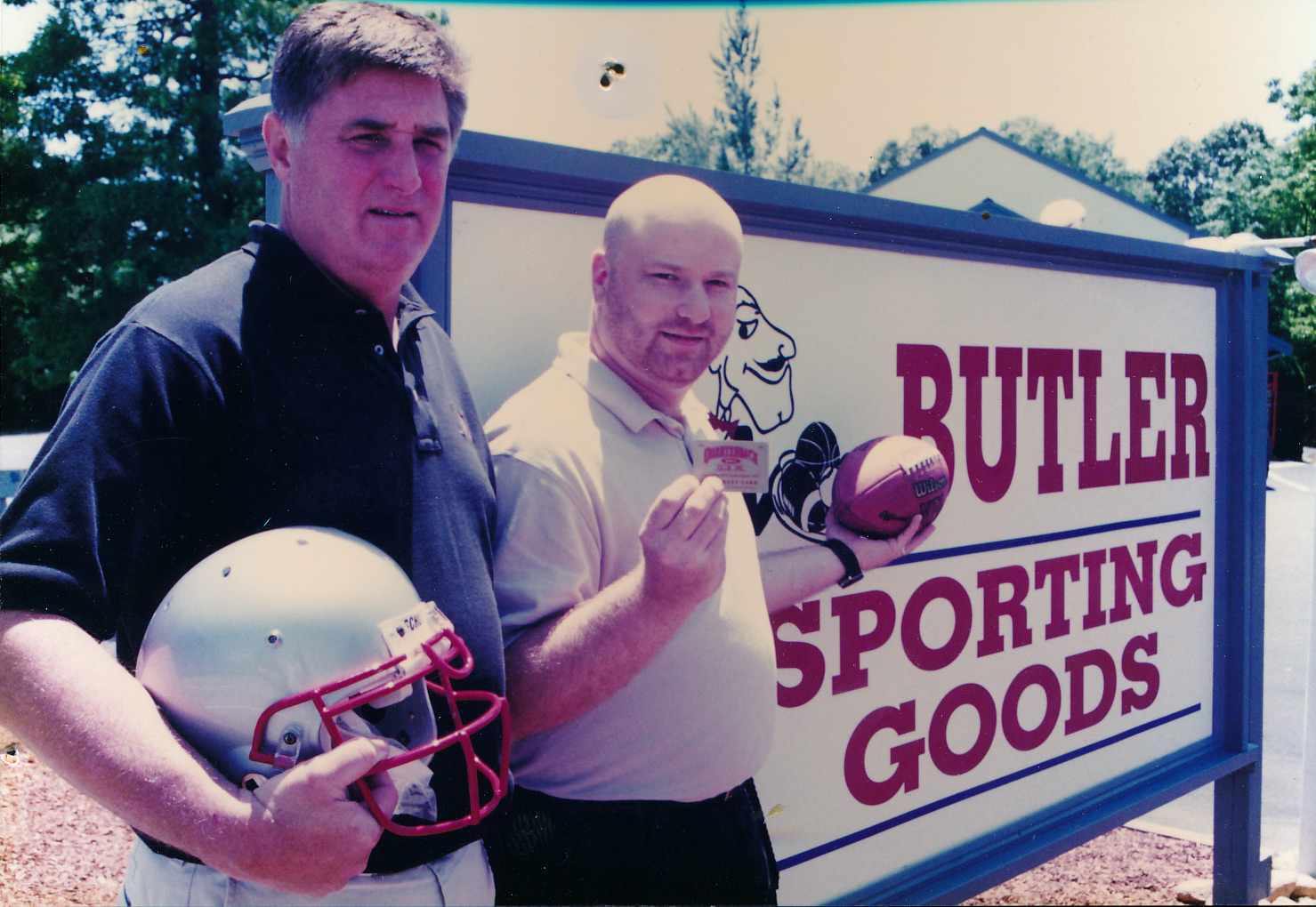 Owner, Jim Butler and General Manager, Sam Fedele in front of Butler Sporting Goods in the early 2000s