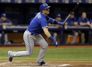 Toronto Blue Jays' Troy Tulowitzki flies out to Tampa Bay Rays right fielder Mikie Mahtook during the second inning of a baseball game Friday, Oct. 2, 2015, in St. Petersburg, Fla.  Tulowitzki, who hasn't played since Sept. 12 after a collision with teammate Kevin Pillar, caused a small crack in his left shoulder blade. (AP Photo/Chris O'Meara)