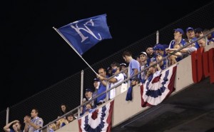 Kansas City Royals fans wave a flag during the sixth inning in Game 1 of baseball's American League Division Series between the Royals and the Houston Astros, Thursday, Oct. 8, 2015, in Kansas City, Mo. (AP Photo/Charlie Riedel)