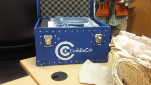 Packaging that contains the "Cuddle Cot" for local hospitals