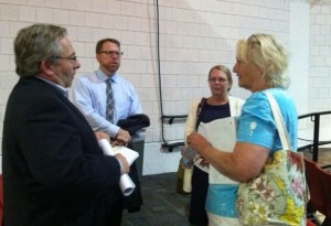 Mark Forest, who is a candidate for County Commissioner; Paul Niedzwiecki, Cape Cod Commission Executive Director; Patti Daley, Cape Cod Commission Deputy Director; Barnstable Town Councilor Ann Canedy talk during the release of the 208 Plan draft to stakeholders last Friday at Cape Cod Community College.