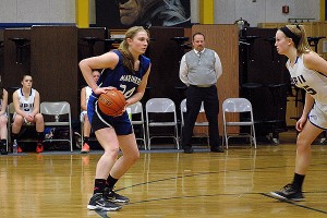 Falmouth Academy's Taylor Mulhearn (24) turned in a phenomenal performance Thursday night in a 53-25 win over Middleboro at home. Sean Walsh/capecod.com sports