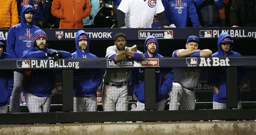 The Chicago Cubs bench watches during the ninth inning of Game 2 of the National League baseball championship series against the New York Mets Sunday, Oct. 18, 2015, in New York. (AP Photo/David J. Phillip)