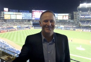 New Zealand Prime Minister John Key prepares to take in the Red Sox-Yankees baseball game Tuesday, Sept. 29, 2015, in New York. "This is a totally unique experience," said Key. "You can't get this anywhere else." In fact, it was Prime Time at the big ballyard in the Bronx. Curacao Prime Minister Ben Whiteman also was in attendance.  (AP Photo/Ben Walker)