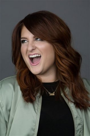 In this March 9, 2016 photo, singer Meghan Trainor poses for a portrait in New York to promote her new hit single, "No." (Photo by Amy Sussman/Invision/AP)