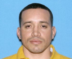 This undated identification photo released by the Massachusetts State Police shows Jorge Zambrano, killed Sunday, May 22, 2016, during an exchange of gunfire with police at an apartment building in Oxford, Mass. Zambrano had been suspected in the shooting death of Auburn, Mass., Police Officer Ronald Tarentino during a traffic stop early Sunday morning. (Massachusetts State Police via AP)