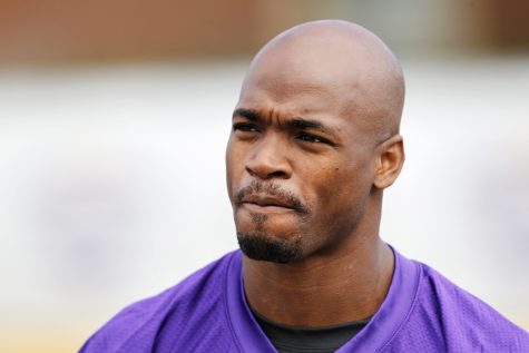 FILE - In this July 29, 2016, file photo, Minnesota Vikings running back Adrian Peterson is shown during the first day of the NFL teams training camp at Mankato State University in Mankato, Minn. A federal appeals court has ruled that the NFL was within its rights when it suspended Vikings star Adrian Peterson in 2014 after he was charged with child abuse. A three-judge panel of the 8th U.S. Circuit Court of Appeals said Thursday, Aug. 4, 2016, that an arbitrator acted appropriately by upholding Commissioner Roger Goodell’s suspension of Peterson for six games. (AP Photo/Andy Clayton-King, File)
