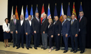 From left to right, Rhode Island Gov. Gina Raimondo, New Brunswick Premier Brian Gallant, Quebec Premier Philippe Couillard, Connecticut Gov. Dannel P. Malloy, Massachusetts Gov. Charlie Baker, Prince Edward Island Premier Wade MacLauchlan, New Hampshire Gov. Maggie Hassan, Maine Gov. Paul LePage, Newfoundland and Labrador Premier Dwight Ball, Vermont Gov. Peter Shumlin, and Nova Scotia Premier Stephen McNeil pose before a conference of New England's governors and eastern Canada's premiers to discuss closer regional collaboration, Monday, Aug. 29, 2016, in Boston. (AP Photo/Elise Amendola)