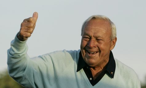 File- This April 5, 2007, file photo shows former Masters champion Arnold Palmer acknowledging the crowd after hitting the ceremonial first tee shot prior to the first round of the 2007 Masters golf tournament at the Augusta National Golf Club in Augusta, Ga. Palmer, who made golf popular for the masses with his hard-charging style, incomparable charisma and a personal touch that made him known throughout the golf world as "The King," died Sunday, Sept. 25, 2016, in Pittsburgh. He was 87. (AP Photo/David J. Phillip, File)