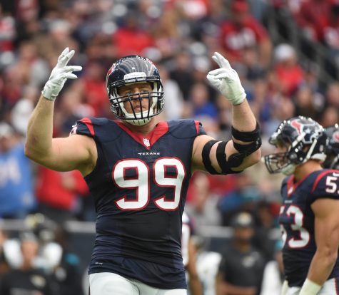 FILE - In this Jan. 3, 2016, file photo, Houston Texans defensive end J.J. Watt (99) gestures during the first half of an NFL football game against the Jacksonville Jaguars, in Houston. A person familiar with J.J. Watt’s condition says he has re-injured his back and the Houston Texans expect him to be out until at least December, and possibly the entire season, Tuesday, Sept. 27, 2016. (AP Photo/Eric Christian Smith, File)