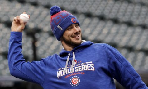 Chicago Cubs third baseman Kris Bryant warms up during a team practice for baseball's upcoming World Series against the Cleveland Indians on Monday, Oct. 24, 2016 in Cleveland.(AP Photo/David J. Phillip)