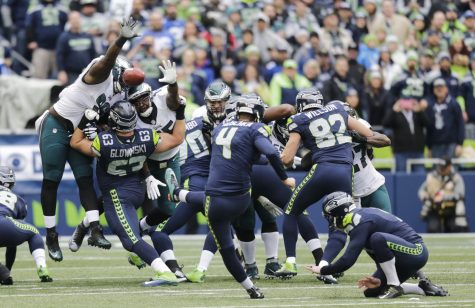 Seattle Seahawks kicker Steven Hauschka (4) has a point-after attempt blocked by Philadelphia Eagles defensive tackle Bennie Logan, upper left, in the first half of an NFL football game, Sunday, Nov. 20, 2016, in Seattle. (AP Photo/Stephen Brashear)
