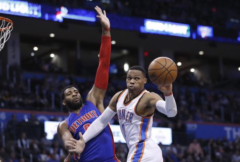 Oklahoma City Thunder guard Russell Westbrook (0) passes in front of Detroit Pistons center Andre Drummond (0) during the second half of an NBA basketball game in Oklahoma City, Saturday, Nov. 26, 2016. Oklahoma City won 106-88. (AP Photo/Alonzo Adams)
