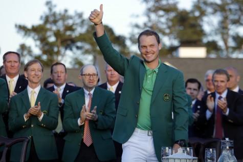 Masters champion Danny Willett, of England, gives a thumbs up after winning the Masters golf tournament Sunday, April 10, 2016, in Augusta, Ga. (AP Photo/Jae C. Hong)