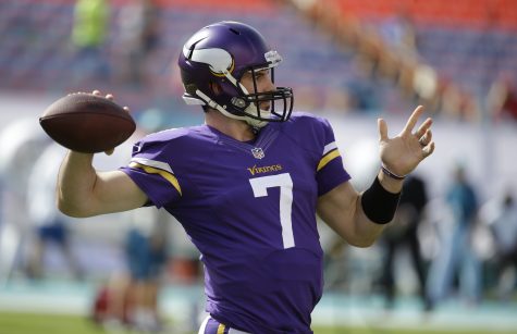Minnesota Vikings quarterback Christian Ponder (7) warms up before an NFL football game against the Miami Dolphins, Sunday, Dec. 21, 2014, in Miami Gardens, Fla. (AP Photo/Lynne Sladky)