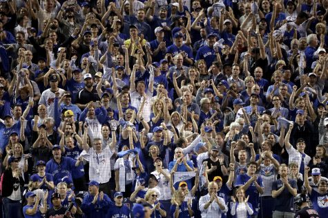 Fans cheer after the Toronto Blue Jays 5-1 win against the Cleveland Indians in Game 4 of baseball's American League Championship Series in Toronto, Tuesday, Oct. 18, 2016. (AP Photo/Charlie Riedel)
