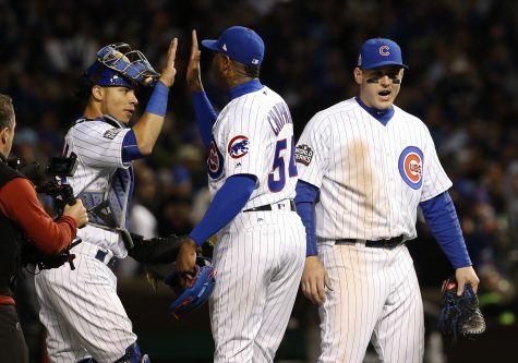 Chicago Cubs' Willson Contreras, left, Aroldis Chapman and Anthony Rizzo celebrate after Game 5 of the Major League Baseball World Series against the Cleveland Indians, Sunday, Oct. 30, 2016, in Chicago. The Cubs won 3-2 as the Indians lead the series 3-2. (AP Photo/Nam Y. Huh)