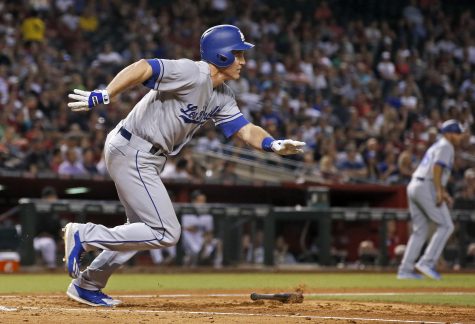 Los Angeles Dodgers' Chase Utley runs to first base on a two-run single against the Arizona Diamondbacks during the fifth inning of a baseball game Tuesday, June 14, 2016, in Phoenix. (AP Photo/Ross D. Franklin)