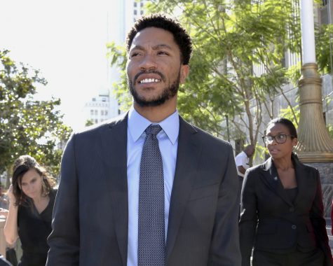 NBA star Derrick Rose leaves federal court in Los Angeles Wednesday, Oct. 19, 2016. Jurors cleared Rose and two friends in a lawsuit that accused them of gang raping his ex-girlfriend when she was incapacitated from drugs or alcohol. The jury reached the verdict Wednesday in Los Angeles federal court after hearing dramatically different accounts of the August 2013 sexual encounter. (AP Photo/Nick Ut)