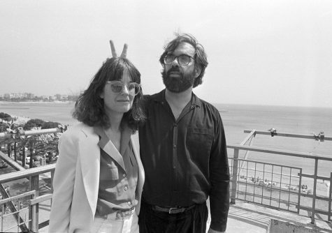 Film director Francis Ford Coppola kids with his wife Ellie for a photographer at the Cannes Film Festival, May 19, 1979. (AP Photo)