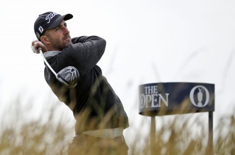 FILE - In this July 20, 2015, file photo, Australia's Geoff Ogilvy plays from the sixth tee during the final round at the British Open Golf Championship at the Old Course in St. Andrews, Scotland. Ogilvy, winner of a U.S. Open and three World Golf Championships, failed to qualify for the FedEx Cup playoffs just as his exemption from his eighth and most recent PGA Tour victory ran out. He thought about playing the Web.com Tour Finals and hasn't entirely ruled it out, though he skipped the first event and is not entered in the second. Instead, he plans to take a one-time exemption for top 50 on the career money list at age 39. (AP Photo/Alastair Grant, File)