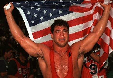 Kurt Angle of the United States celebrates his gold medal in the 100 kg class of freestyle wrestling at the Centennial Olympic Games in Atlanta Wednesday July 31, 1996.  Angle defeated Abbas Jadidi of Iran.  (AP Photo/Michel Lipchitz)