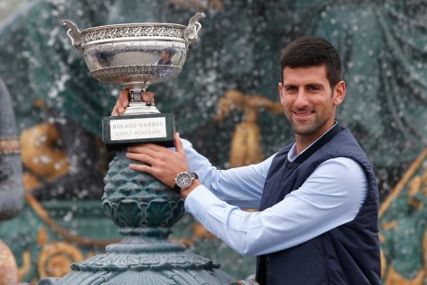 Novak Djokovic, from Serbia, poses with the French Open tennis trophy during a photo session at the Place de la Concorde, in Paris, Monday June 6, 2016. Djokovic was the winner against Britain's Andy Murray in four sets 3-6, 6-1, 6-2, 6-4. (AP Photo/Thibault Camus)