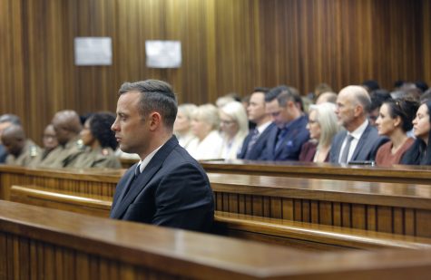 Oscar Pistorius appears in the High Court, for sentencing proceedings, Tuesday, June 14, 2016 in Pretoria, South Africa. An appeals court found Pistorius guilty of murder, and not culpable homicide, for the shooting death of his girlfriend Reeva Steenkamp. (Kim Ludbrook/Pool Photo via AP)