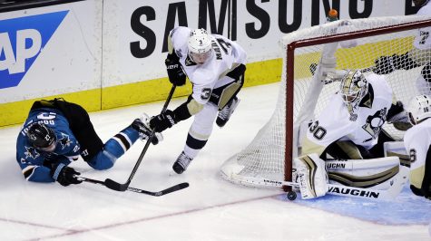 Pittsburgh Penguins' Matt Murray, right, defends against San Jose Sharks' Joonas Donskoi (27) during the second period of Game 4 of the NHL hockey Stanley Cup Finals on Monday, June 6, 2016, in San Jose, Calif. At center is Penguins' Olli Maatta (3). (AP Photo/Eric Risberg)