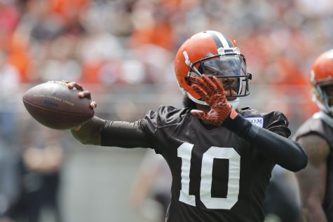 Cleveland Browns quarterback Robert Griffin III plays in their orange and brown scrimmage at the NFL football team's training camp Saturday, Aug. 6, 2016, in Columbus, Ohio. (AP Photo/Jay LaPrete)