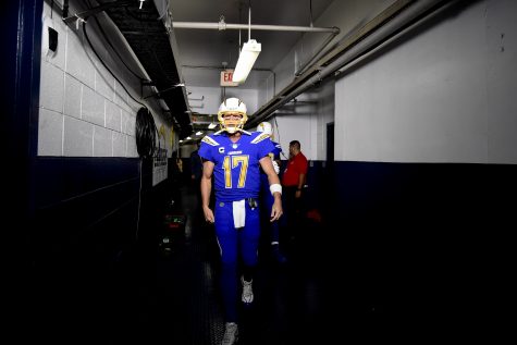 San Diego Chargers quarterback Philip Rivers gets ready to come onto the field before an NFL football game against the Denver Broncos Thursday, Oct. 13, 2016, in San Diego. (AP Photo/Denis Poroy)