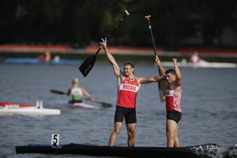 FILE In this Sunday, Aug. 10, 2014 file photo Winners Nikolay Lipkin, center, and Andrey Kraitor of Russia celebrate after they won the C1 relay men 200m final of the ICF Canoe Sprint World Championships 2014 in Moscow, Russia. The International Canoe Federation says it has barred five Russian competitors from the Rio Olympics. The five include Olympic gold medalist Alexander Dyachenko as well as Andrei Kraitor. (AP Photo/Pavel Golovkin, File)