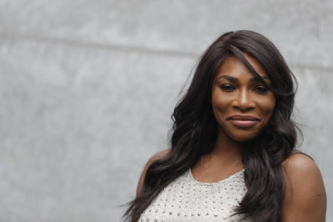 FILE - In this Sept. 23, 2016, file photo, U.S. tennis star Serena Williams poses for photographers prior to the start of the Giorgio Armani women's Spring-Summer 2017 fashion show, that was presented in Milan, Italy. Williams penned an open letter for Porter Magazine that was republished by the Guardian newspaper on Nov. 29, 2016. In it, she calls on women to "continue to dream big." (AP Photo/Luca Bruno, File)