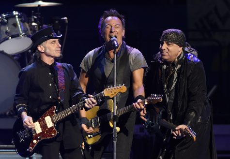FILE - In this March 15, 2016 file photo, Bruce Springsteen, center, performs with Nils Lofgren, left, and Steven Van Zandt of the E Street Band during their concert at the Los Angeles Sports Arena in Los Angeles. Bruce Springsteen and the E Street Band just don't want to leave the stage. The concert Wednesday, Sept. 7, 2016, at Citizens Bank Park in Philadelphia lasted nearly four hours, four minutes, breaking the previous record for the group's longest U.S. show set last week. (Photo by Chris Pizzello/Invision/AP, File)