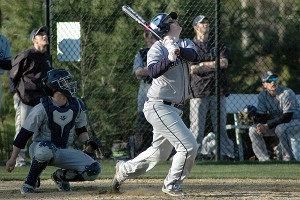 Sturgis East's Cooper Gavin watches the flight of his pop fly in The Storm's 8-6 loss to host Cape Cod Academy. Jack Massari is behind the plate. Sean Walsh/Capecod.com Sports Photos