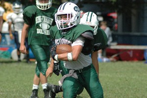 Dennis-Yarmouth's Jack Peterson takes off running in Saturday's scrimmage against Somerville. Sean Walsh/Capecod.com Sports