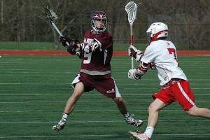 Falmouth senior Arlin Moore tries to get past Barnstable's Jack Pipatti in Wednesday's 11-8 Red Raider victory. Sean Walsh/Capecod.com Sports