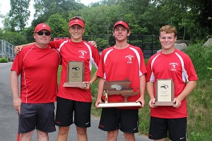 Barnstable High boys' tennis coach Mike Sarney shares a moment of pride with his state doubles champions Cooper Blaze and Donnie Brodd and runner-up singles champ Tyler Shibles. Photo courtesy of Betsy Brodd