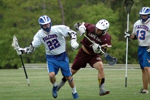 Mashpee senior Jack Moran (22) scored three goals and had two assists and Cape Tech's Dave Carty (2) had a goal and assist in the 11-10 lacrosse barnburner won by the Crusaders to end the two teams' season Thursday afternoon. Sean Walsh/Capecod.com Sports