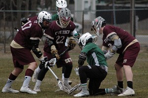 Cape Cod Tech's Max Fermino (17), Jake Dipilato and Dave Carty all attack the Sturgis West ball-handler in Thursday's 8-5 loss to the Navigators. Dipilato and Carty both scored goals in the loss. Sean Walsh/Capecod.com Sports Photos