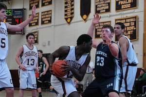 Cape Tech senior Alonzo Johnson tears down the biggest rebound of the game on a missed shot with just seconds left and eliminated Cape Cod Academy's hope to clinch a postseason berth - at least for the next 48 hours. Also pictured are Sean Campbell (13) Henry Zezze (23) and Josh Meservey. Sean Walsh/Capecod.com Sports