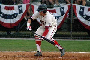 NC State's Brock Deatherage - who earlier in the night belted his first homer of the season - lays down a perfect bunt against Brewster at Whitehouse Field. Sean Walsh/Capecod.com Sports