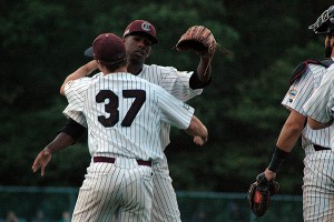 Mississippi State's Daniel Brown (37) hugs Boston College's Justin Dunn after the win. Dunn got the save, Brown got the win for Cotuit. Sean Walsh/Capecod.com Sports