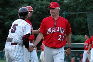 Orleans Firebirds field manager Kelly Nicholson congratulates Cotuit helmsman Mike Roberts on the win. Sean Walsh/Capecod.com Sports