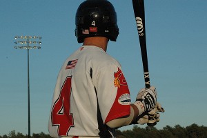 Bourne Braves' Cam Duzenack (Dallas Baptist) as the sun sets at Doran Park.. Sean Walsh/Capecod.com Sports