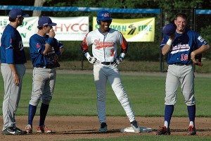 Hyannis Harbor Hawks' slugger JaVon SHelby (Kentucky) shares a recent laught with Chatham Anglers' infielders Zach Short and  Cory Raley. Sean Walsh/Capecod.com Sports